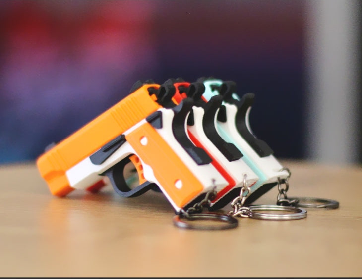 Fidget Gun Keychain – Slide-Action Toy