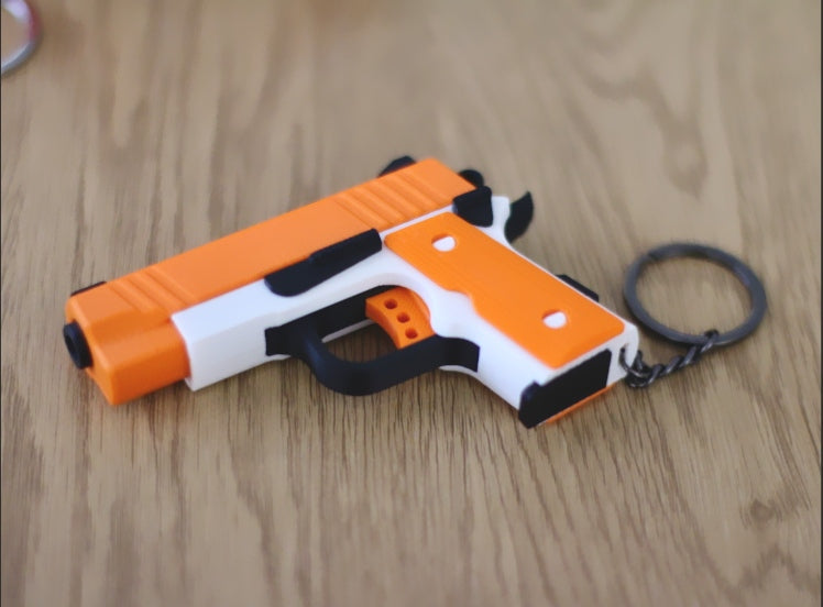 Fidget Gun Keychain – Slide-Action Toy