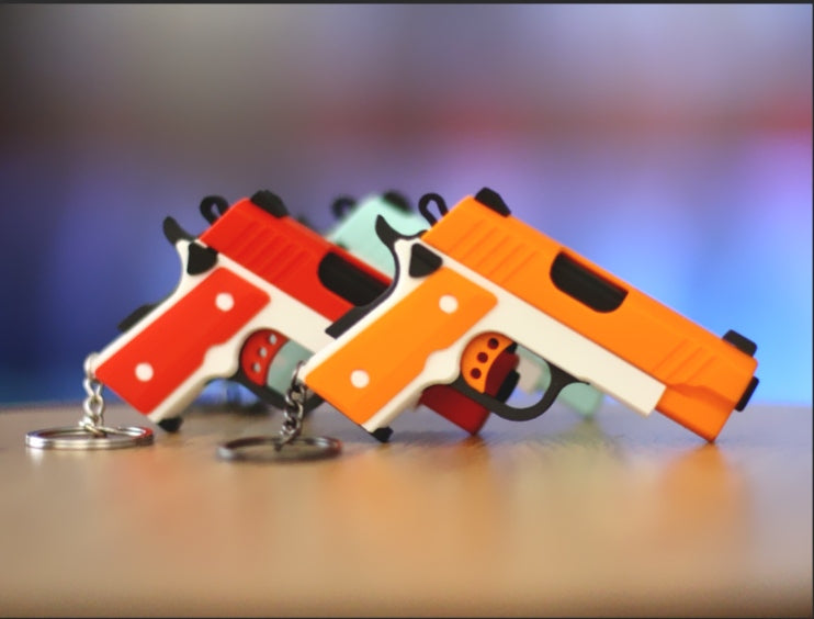Fidget Gun Keychain – Slide-Action Toy